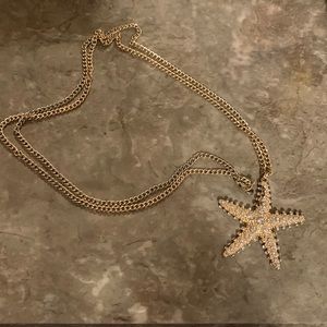 Long gold starfish necklace